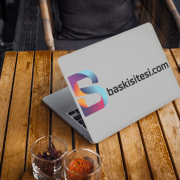 laptop-cover-mockup-featuring-a-computer-on-a-wooden-table-2287-el1